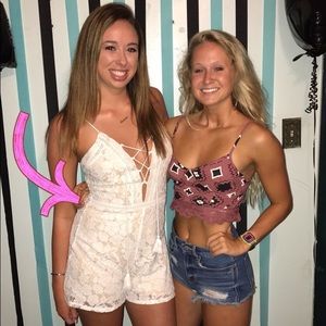 white lace plunge v-neck laced up romper